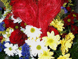 Blumenstrauss mit Herz im Wasser